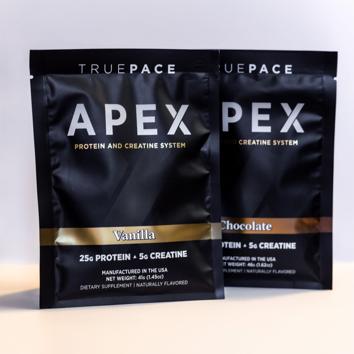 truePACE APEX Mixed pack of Vanilla and Chocolate protein and creatine packets on a white background