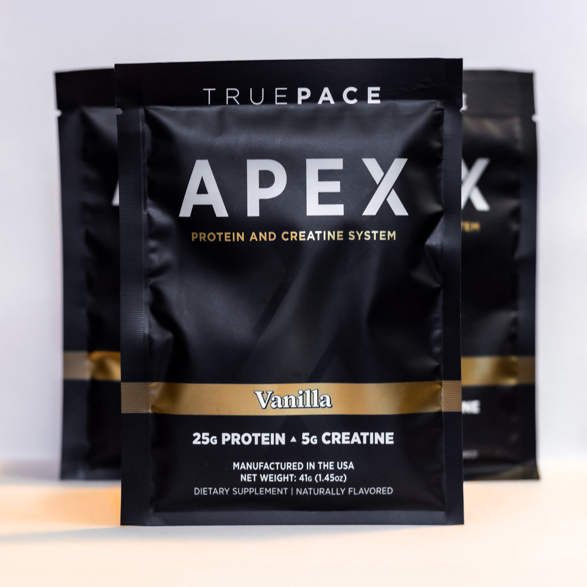 truePACE APEX Vanilla multi-pack of single-serve protein and creatine packets on a white background
